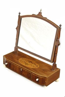 Appraisal: An early th century mahogany and marquetry dressing table mirror