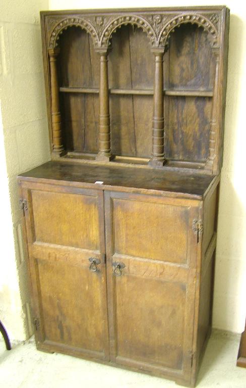 Appraisal: th century provincial oak cupboard with panelled double doors applied