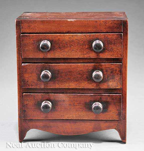 Appraisal: A Regency Carved Mahogany Miniature Chest early-to-mid th c three