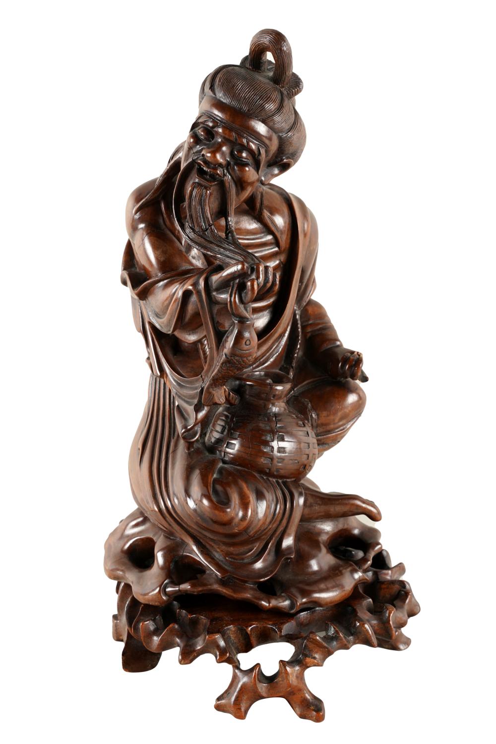 Appraisal: CHINESE CARVED HARDWOOD FIGUREon wooden stand inches high inches high