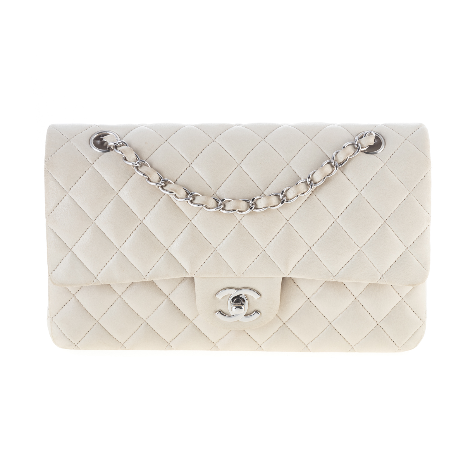 Appraisal: A CHANEL MEDIUM DOUBLE FLAP BAG An ivory Lambskin leather