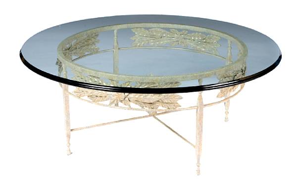 Appraisal: A paint decorated wrought iron and tole circular coffee table