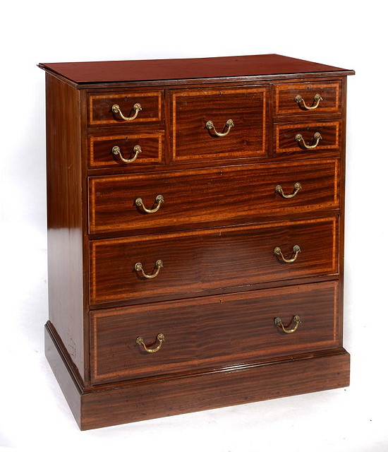 Appraisal: AN EDWARDIAN MAHOGANY CHEST with an arrangement of eight various