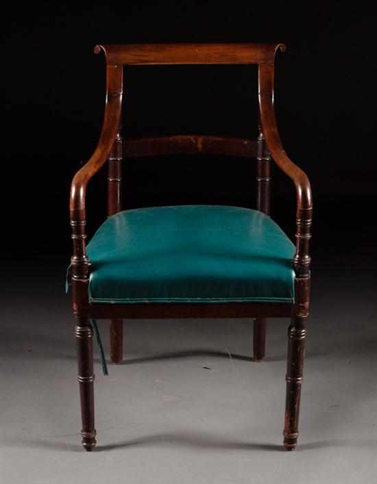 Appraisal: Regency carved walnut upholstered armchair circa bowed crest rail and