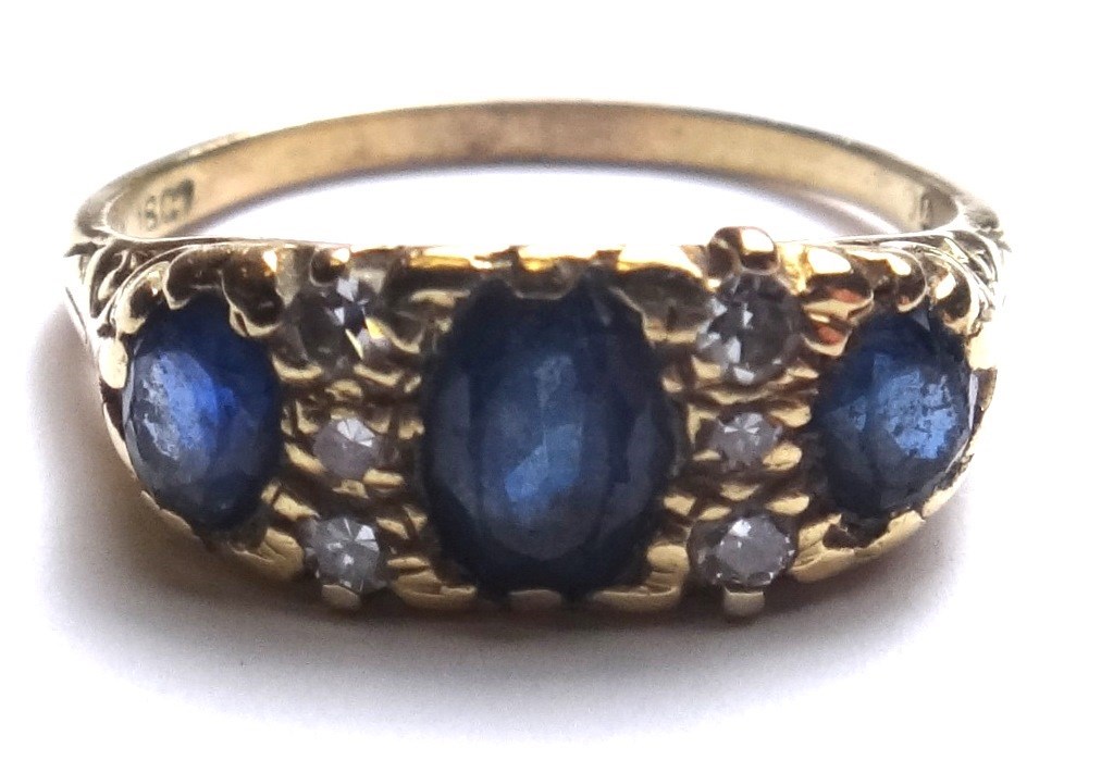 Appraisal: A gold sapphire and diamond set ring mounted with three