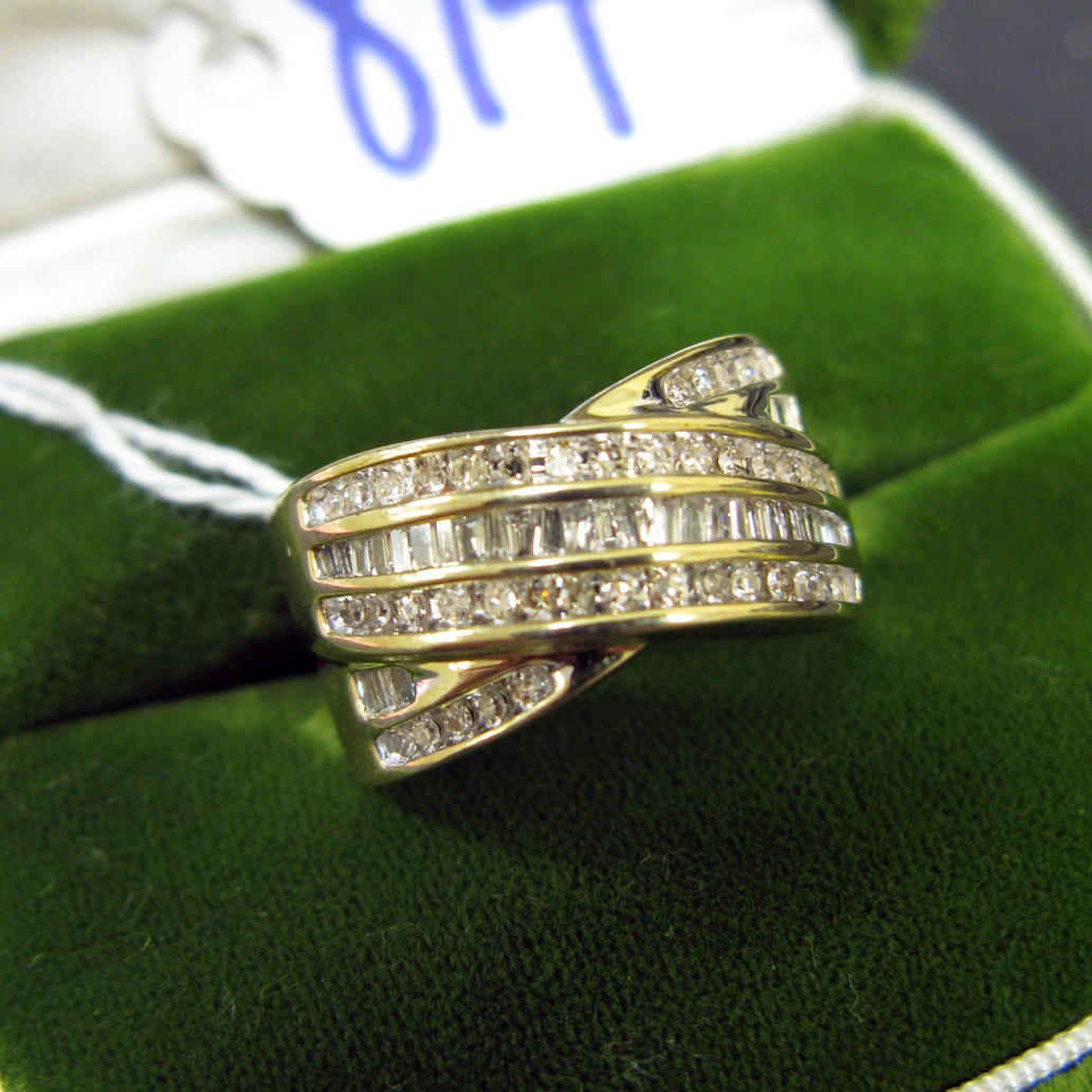 Appraisal: DIAMOND AND FOURTEEN KARAT GOLD RING set with round-cut and