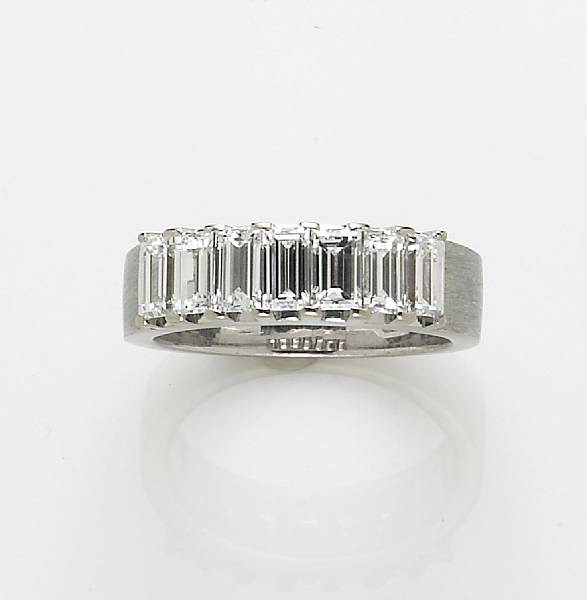 Appraisal: An emerald-cut diamond and k white gold ring estimated total