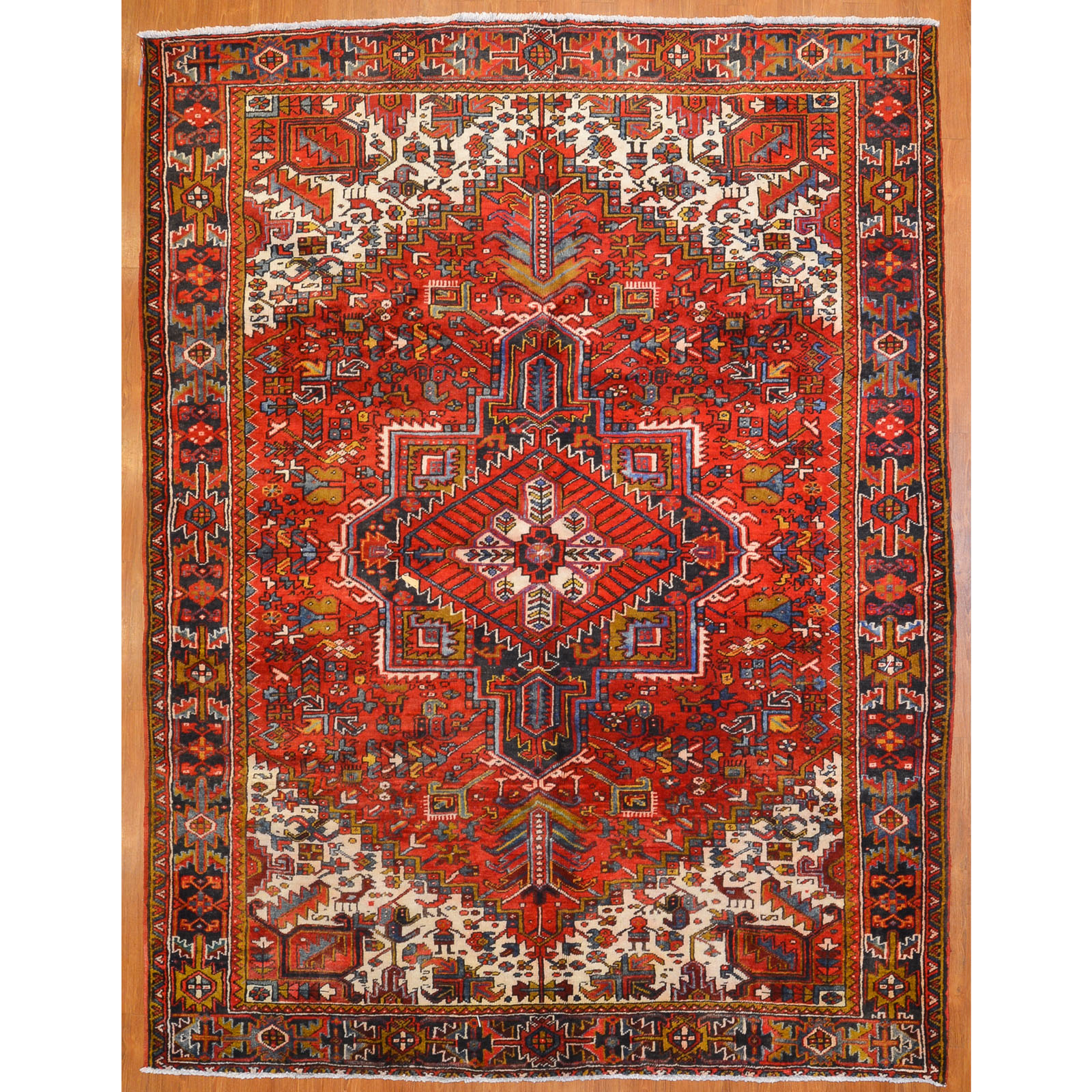 Appraisal: HERIZ RUG PERSIA X Fourth quarter- th century hand-knotted wool