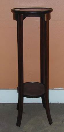 Appraisal: Edwardian Mahogany Plant Stand ca the circular top with raised