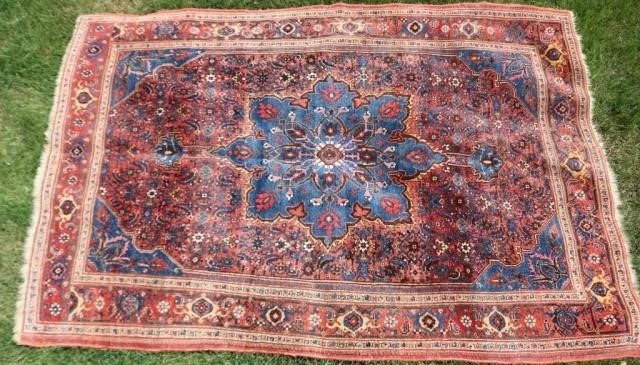 Appraisal: CA PERSIAN RUG BLUE FIELD WITH OVERALLFLORAL DESIGN EVEN OVERALL