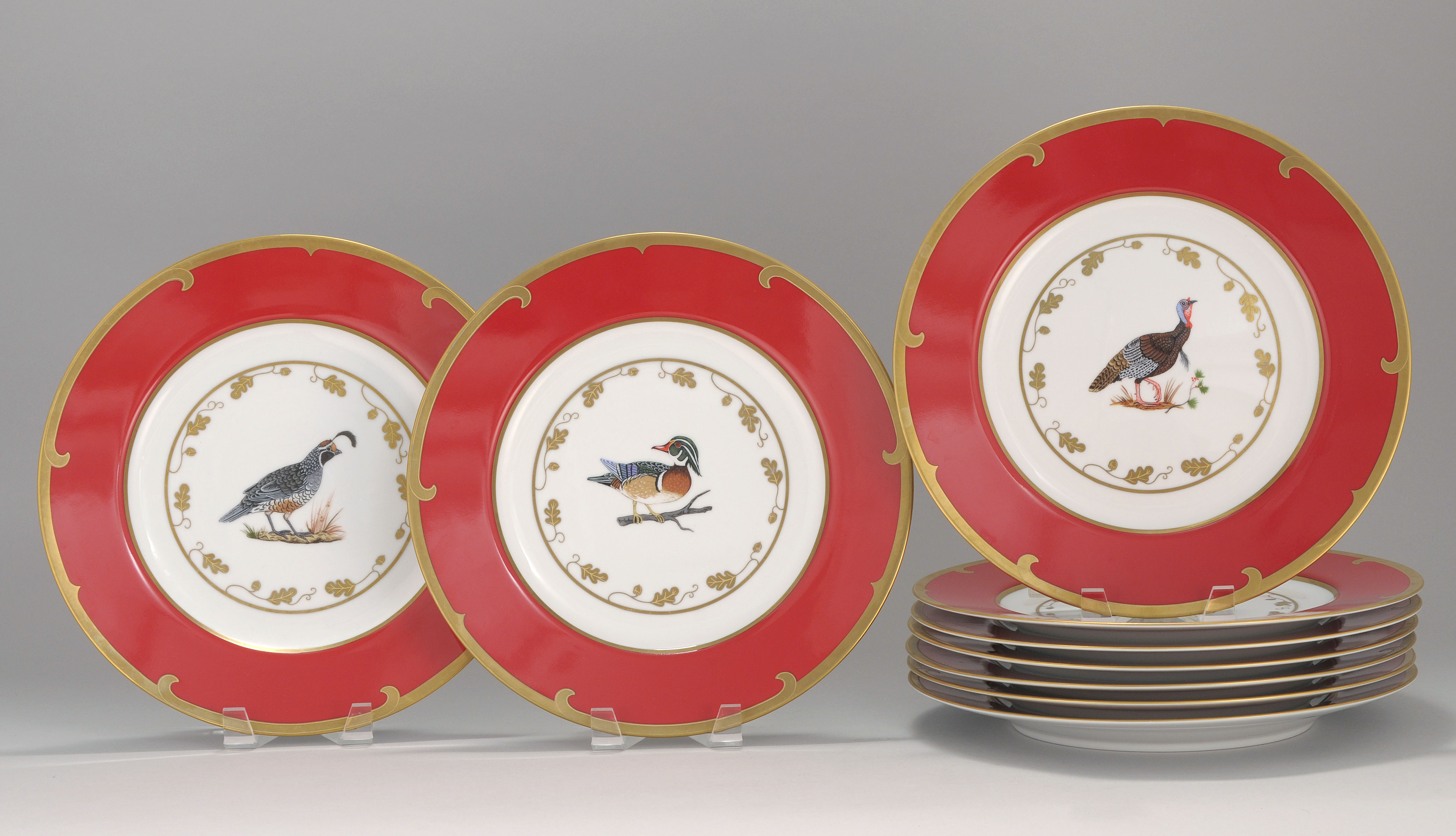 Appraisal: SET OF NINE CONTEMPORARY PORCELAIN SERVICE PLATES In the Chase