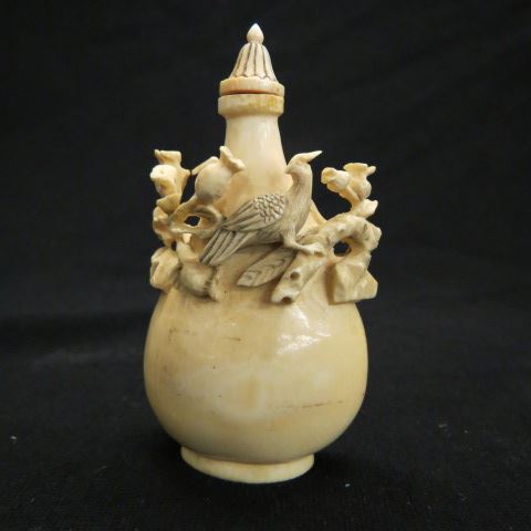 Appraisal: Chinese Carved Ivory Snuff Bottle raised bird floral decor signed