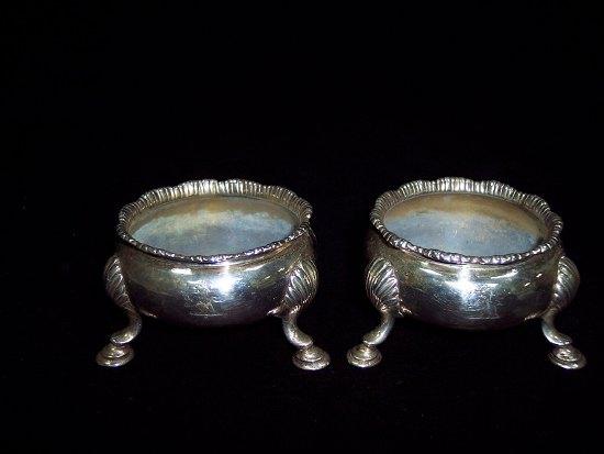 Appraisal: A pair of George II circular salts each with wavy