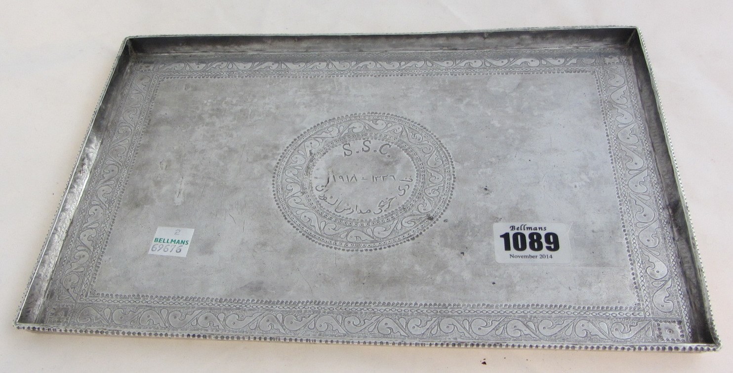 Appraisal: An Eastern rectangular tray with engraved decoration to the border