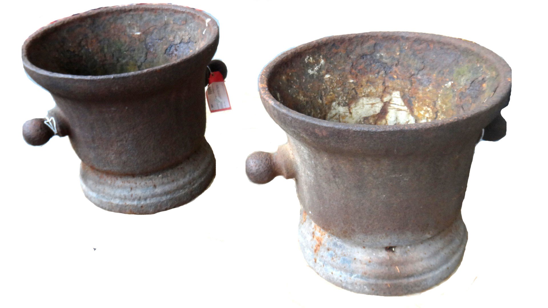 Appraisal: A pair of large cast iron mortars probably th century