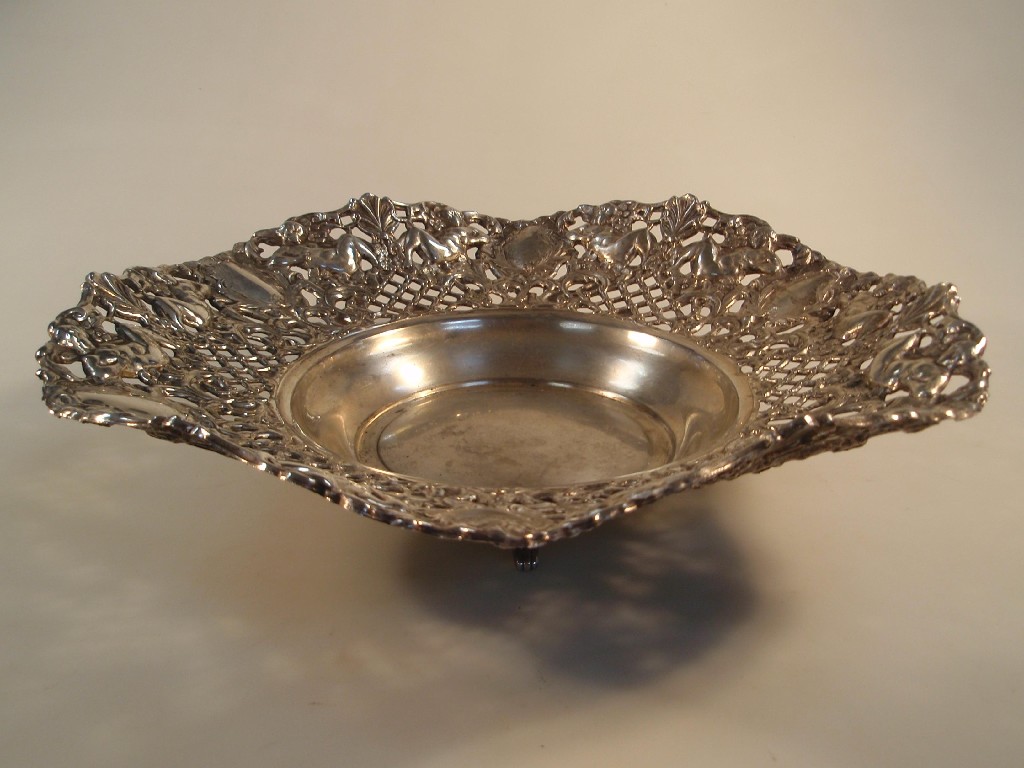 Appraisal: A Spanish white metal bowl the dished well within a