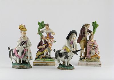 Appraisal: A pair of pearlware figures of a lady with a