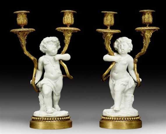 Appraisal: PAIR OF BISCUIT CANDELABRAS AU PETIT BACCHANT late Louis XVI