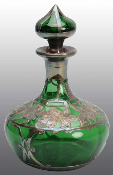 Appraisal: Heavy Silver Overlay Green Glass Perfume Bottle Description Floral design