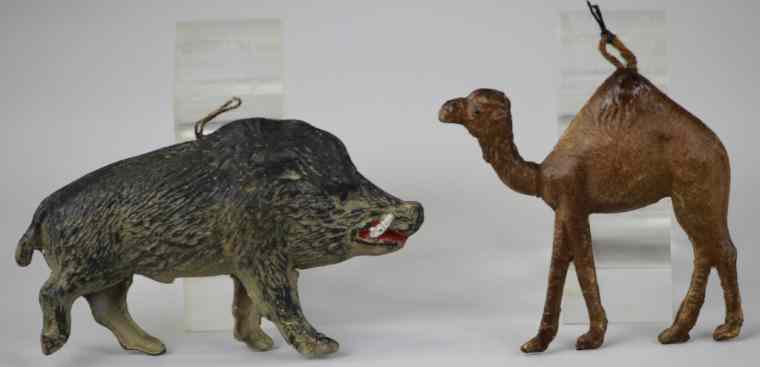 Appraisal: WILD BOAR SMALL CAMEL DRESDEN ORNAMENTS A ferocious looking wild