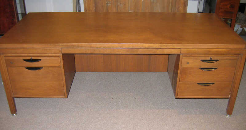 Appraisal: JENS RISOM DANISH Large rectangular teak desk raised on straight