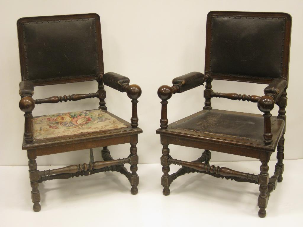 Appraisal: Pair of unusual oak Edwardian Armchairs wide seats between spherical