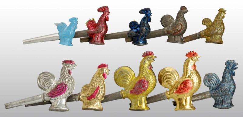 Appraisal: Lot of Tin Rooster Whistle Toys Description Japanese Pre-war Moderate