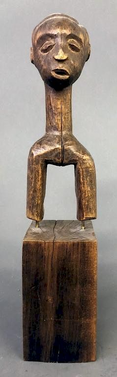 Appraisal: Baule Heddle Pulley Bust Figure Baule tribe heddle pulley weaving