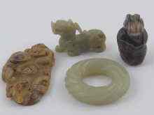 Appraisal: Three Chinese jade one agate carvings being a swirl torus