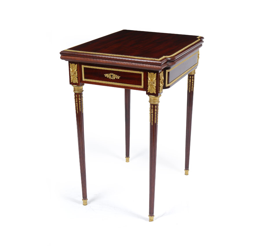 Appraisal: MAHOGANY ORMOLU GILT BRONZE GAME TABLE Shaped top with textured