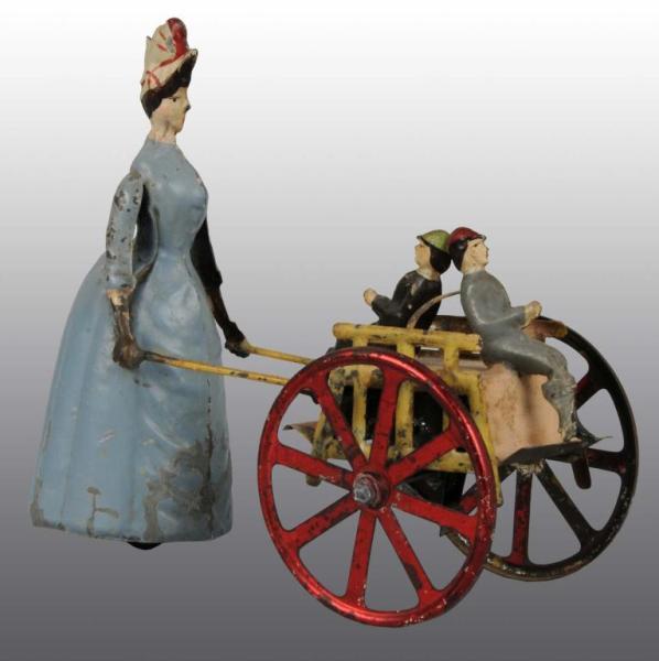 Appraisal: Tin Hand-Painted Woman Pushing Boys in Cart Toy Description German