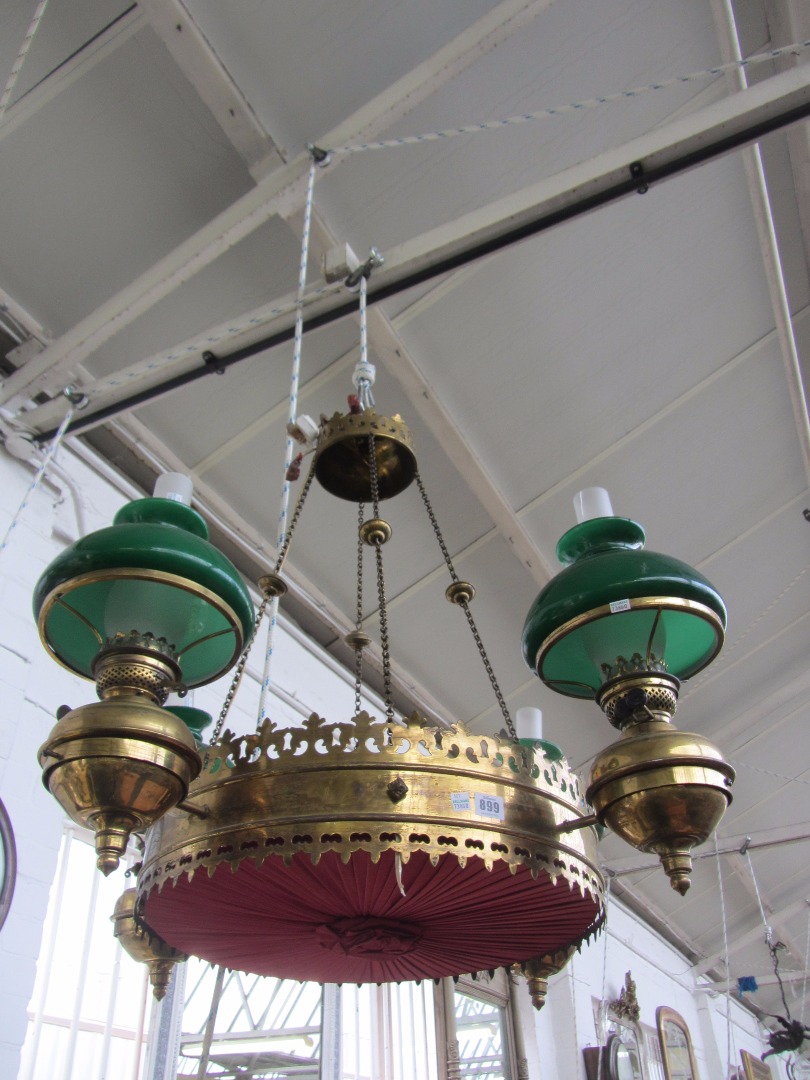 Appraisal: A Victorian circular brass hanging light in the Gothic taste