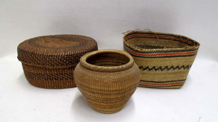 Appraisal: THREE NATIVE AMERICAN BASKETS two are Makah covered oval shape