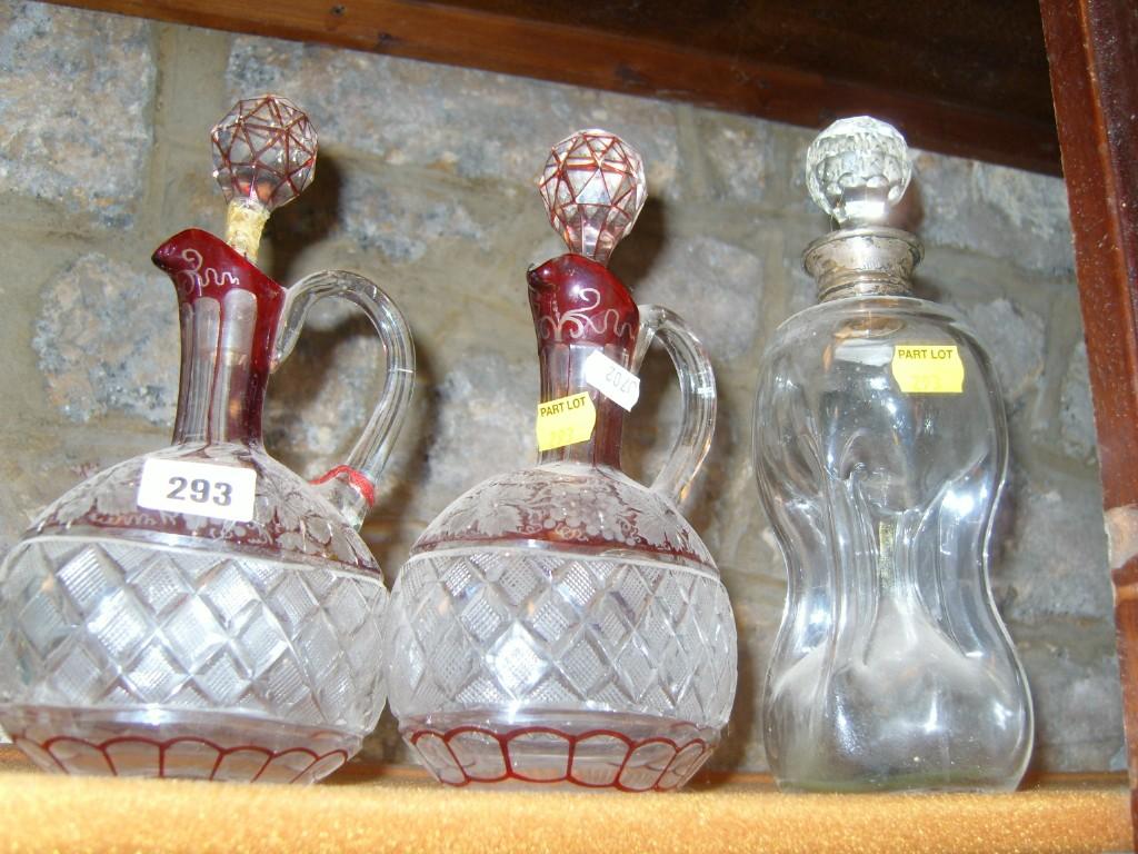 Appraisal: A pair of th century cut glass decanters and stoppers