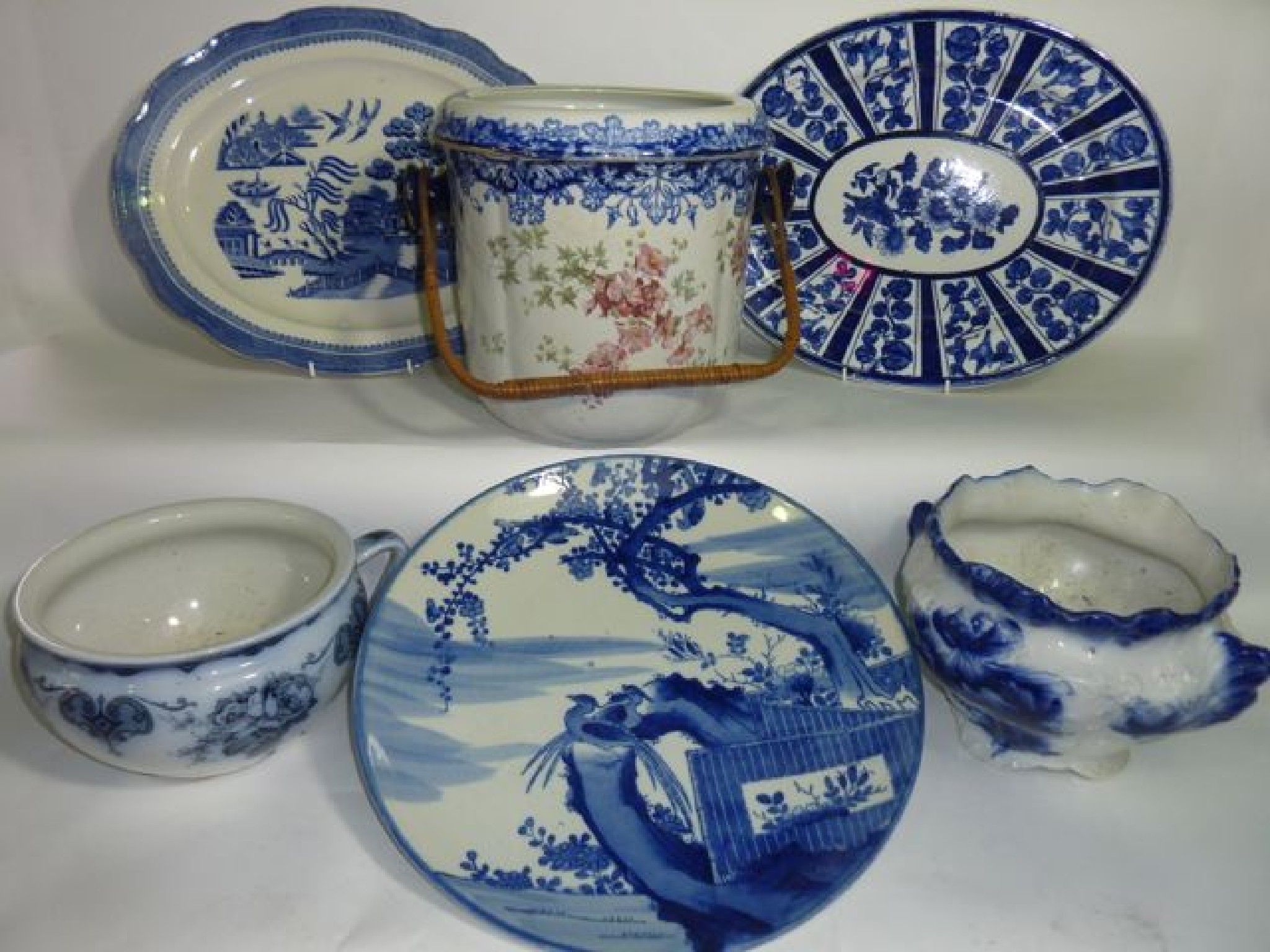 Appraisal: An oriental blue and white painted charger with bird and