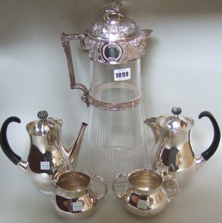 Appraisal: A plated metal mounted glass large claret jug with a