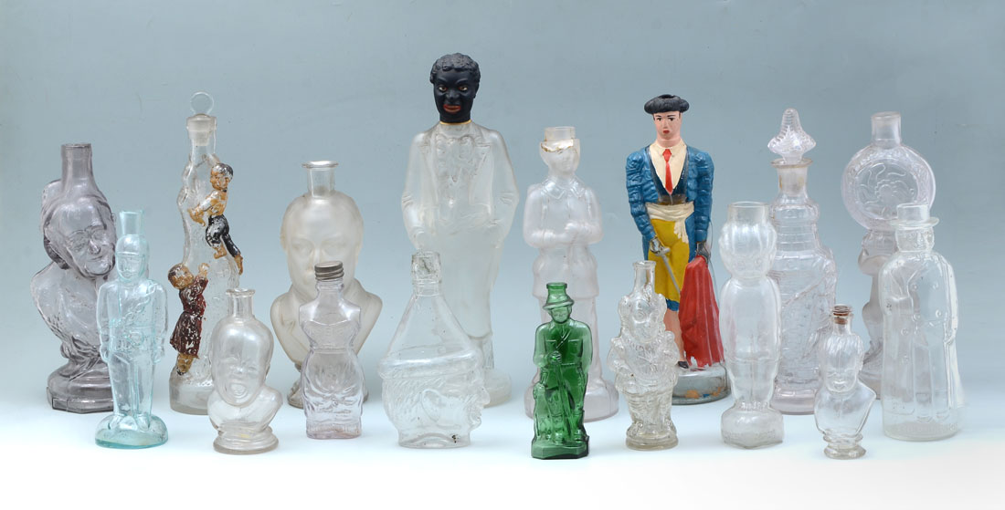 Appraisal: COLLECTION OF ANTIQUE FIGURAL BOTTLES An assembled collection of bottles