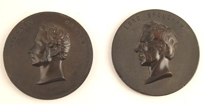 Appraisal: Two bois durci circular portrait medallions Lord Brougham and Richard