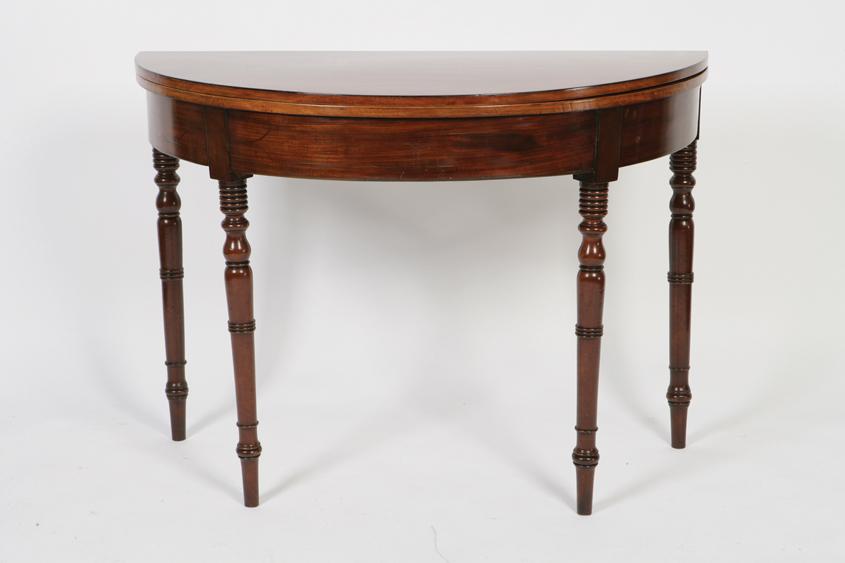 Appraisal: A REGENCY MAHOGANY FOLD TOP TEA TABLE the D -shaped