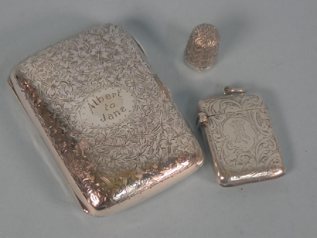 Appraisal: A Victorian and later silver cigarette case engraved with flowers