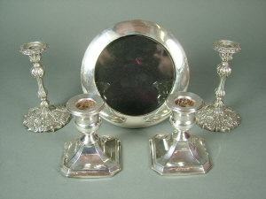 Appraisal: A pair of Victorian silver dwarf candlesticks Birmingham c Each