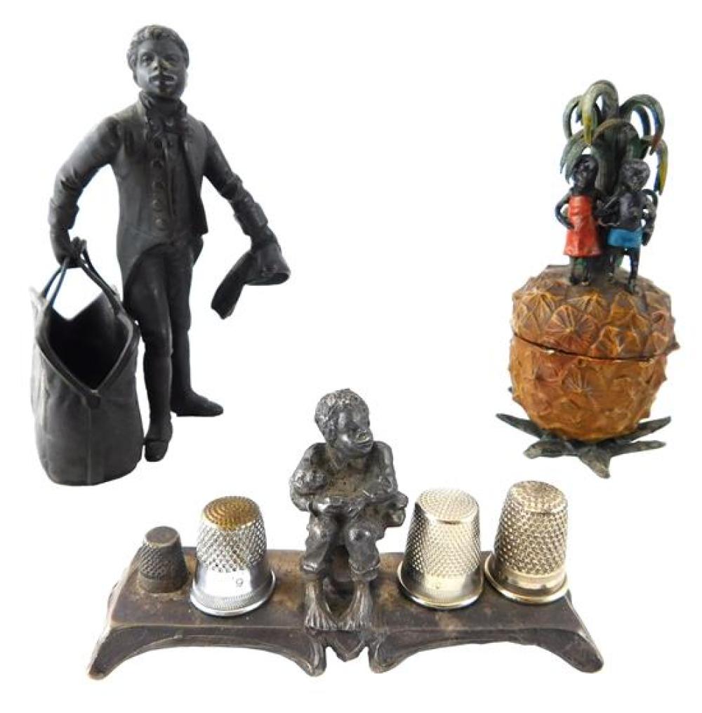 Appraisal: BLACK AMERICANA Three early ''s metal figures depicting African Americans