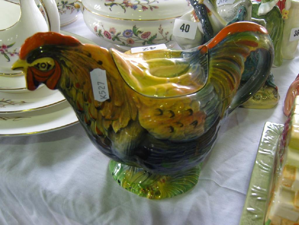 Appraisal: A teapot and cover in the form of a cockerel