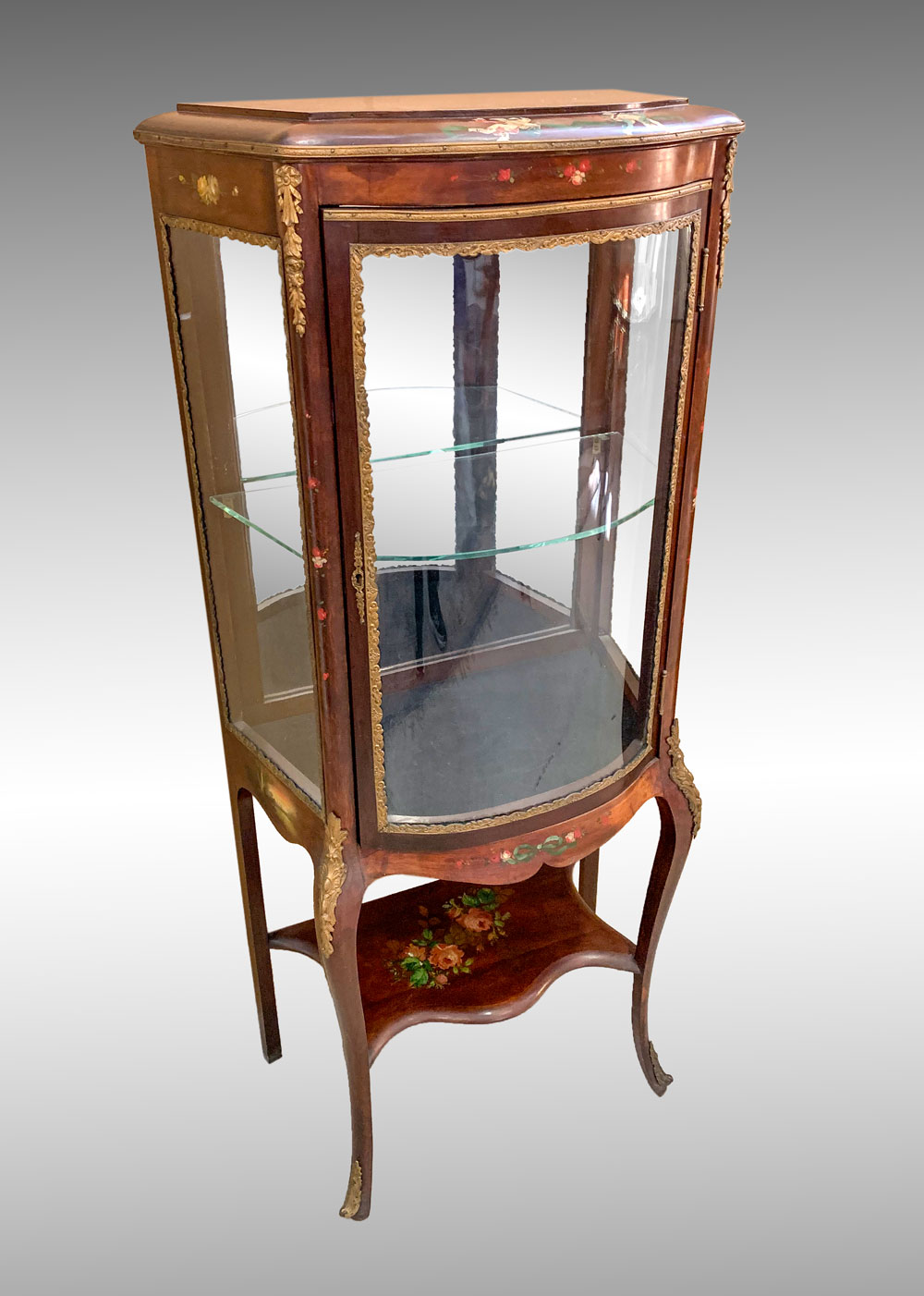 Appraisal: FRENCH PAINT DECORATIVE CURIO BOWFRONT CABINET French curio cabinet having