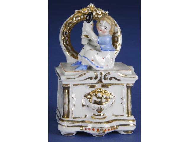 Appraisal: Porcelain Trinket Box Germany ca glazed porcelain dresser with child