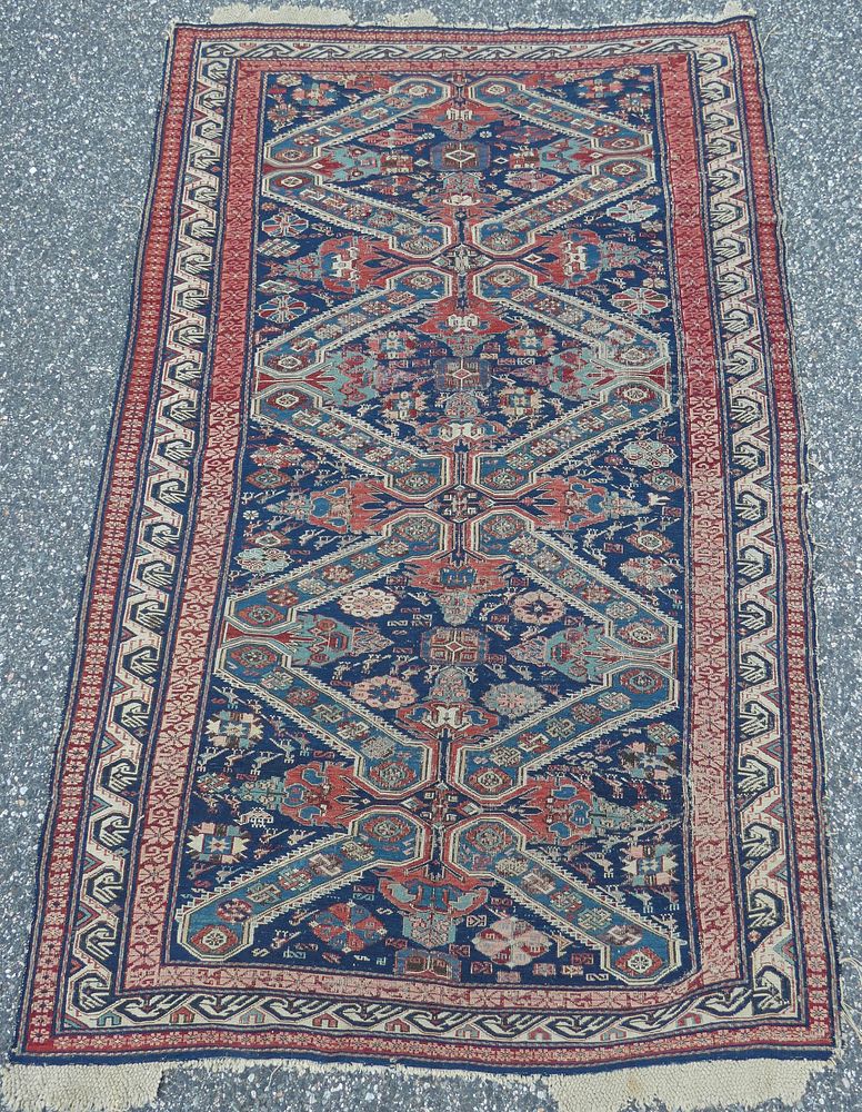 Appraisal: ANTIQUE KAZAK RUG Antique Kazak scatter rug with blue field