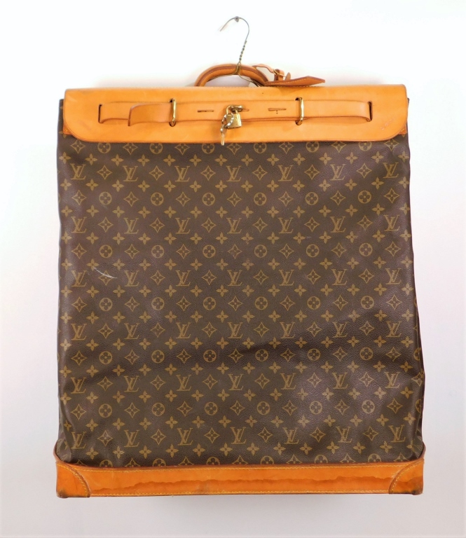 Appraisal: LOUIS VUITTON MONOGRAMMED STEAMER BAG France th CenturyLeather steamer bag