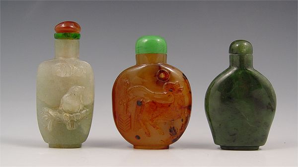 Appraisal: CHINESE CARVED STONE SNUFF BOTTLE Group of to include horse