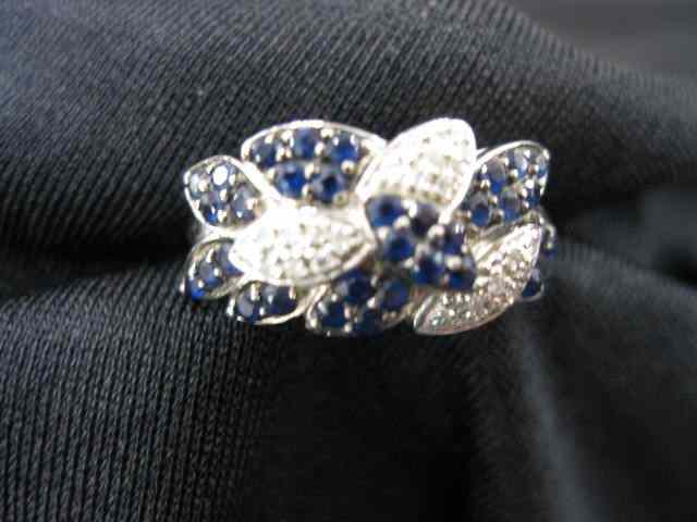 Appraisal: Sapphire Diamond Ring deep blue sapphires and diamonds total carat