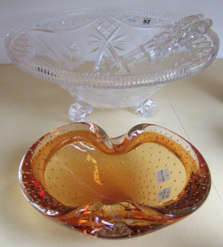 Appraisal: A large cut glass bowl raised on three small feet